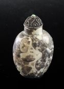 A Chinese fossiliferous limestone snuff bottle, 1850-1930, of flattened ovid form, 5.5cm, filigree