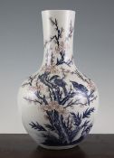 A Chinese underglaze blue and copper red bottle vase, 18th / 19th century, painted with two crows