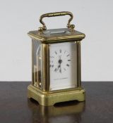 A Mappin & Webb miniature carriage alarum timepiece, with enamelled Roman dial and movement striking