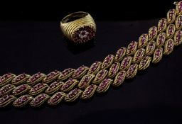A late 1960`s 18ct gold and ruby set articulated bracelet and similar ruby and diamond set dress