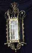 A large Gothic style brass hanging hall lantern, with glazed panels, trefoil pierced borders and