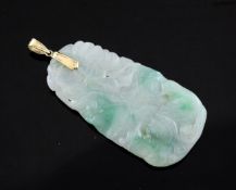 A gold mounted carved jadeite pendant, 2in.