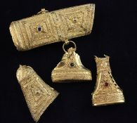 A Persian high carat gold scabbard mounts, set with coloured paste stones, gross 123 grams. (a.f.)