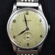 A gentleman`s late 1940`s stainless steel Longines manual wind wrist watch, with part Arabic dial