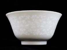 A rare Chinese `lotus window` bowl, Xuande mark, Qianlong period, the finely potted tapering bowl