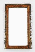 A George II walnut and parcel gilt rectangular wall mirror, with bevelled plate glass and