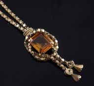 An Italian 18ct gold and synthetic? orange sapphire set drop pendant necklace, with emerald cut