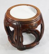 A Chinese rosewood and grey marble topped child`s stool, late 19th / early 20th century, of barrel