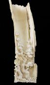 A fine Chinese ivory wrist rest, 19th century, carved to the exterior as a section of bamboo