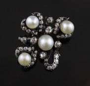 An Edwardian gold and silver, natural pearl and diamond brooch, modelled as a clover, set with