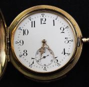 An early 20th century Swiss 14ct gold hunter minute repeating keyless lever pocket watch, the Arabic