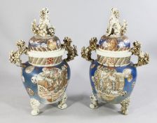 A pair of massive Japanese Satsuma pottery koros and covers, early 20th century, each decorated with