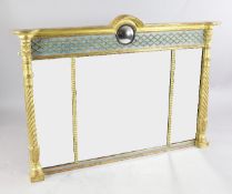 A Regency carved giltwood overmantel mirror the arched frieze with central convex mirror glass and