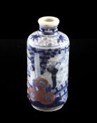 A Chinese underglaze blue and copper red snuff bottle, Yongzheng mark, 1830-1900, painted with two