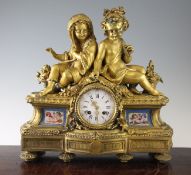 A 19th century French ormolu mantel clock, surmounted with figures of children representing winter