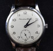 A gentleman`s stainless steel IWC manual wind wrist watch, with Arabic dial and subsidiary