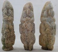 A group of three Nigerian stone fetish figures, variously carved, largest 9in.