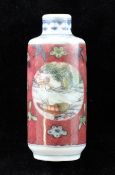 An unusual Chinese famille rose sang-de-boeuf ground snuff bottle, 1830-1900, painted with river
