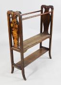 A late 19th century Dutch mahogany and floral marquetry towel rail, with vase shaped panel ends