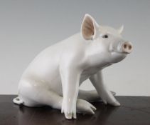 A Royal Copenhagen model of a pig, 20th century, model 414, printed Royal Copenhagen marks, 22.5cm.