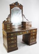 A late 19th century Dutch mahogany and floral marquetry inlaid pedestal dressing table, with