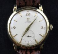 A gentleman`s early 1950`s gold plated and steel Omega automatic wrist watch, with baton and