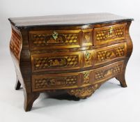 An 18th century South German bombe shape commode, with perspective cube and marquetry inlaid