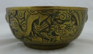 A Chinese cast bronze censer, 19th century, cast and chased with dragons to the exterior within
