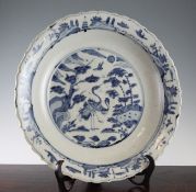 A Chinese Ming blue and white dish, Swatow, early 17th century, finely painted to the centre with