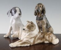 Three Royal Copenhagen models of dogs, 20th century, a bloodhound model 1322, a rough collie model
