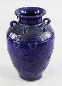 A large Chinese Martavan jar, 17th / 18th century, of ovoid form, covered in a thick cobalt blue