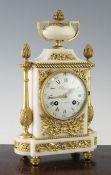 An early 20th century French ormolu mounted white marble clock garniture, the clock with