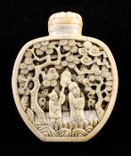 A rare Chinese ivory `sage and attendant` snuff bottle and stopper, 1796-1850, carved in high relief