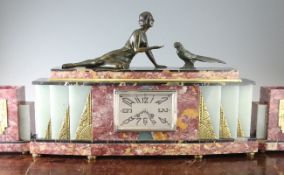 A large French marble and onyx clock garniture, the rectangular dial and twin train movement with