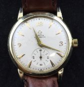 A gentleman`s early 1950`s gold plated Omega automatic wrist watch, with Arabic and baton numerals