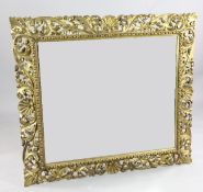 A large Florentine rectangular gilt wall mirror, with shell and acanthus scroll pierced frame,