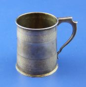 A George IV silver christening mug, of tapering form, with two reeded bands, maker, R?, London,