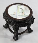 A Chinese rosewood and porcelain topped stand, late 19th century, the circular porcelain inset