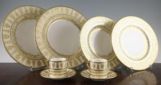 A Minton Trophies H5329 pattern dinner and coffee service, comprising thirteen breakfast plates, six