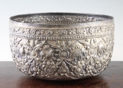 A large Burmese silver bowl, early 20th century, embossed and chased with zodiac animals,