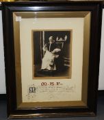 A framed and glazed papal blessing, mounted with a photograph of Pope Pius XI by G. Felici Roma,