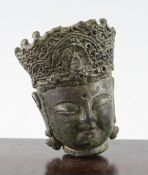 A Chinese bronze head of a Bodhisattva, Song - Ming dynasty, with scrollwork head-dress centred by