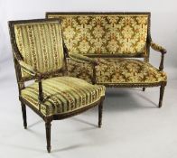 A Louis XVI style carved giltwood five piece salon suite, to include a settee with over stuffed seat