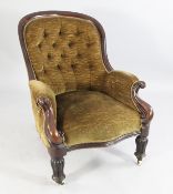 A Victorian mahogany tub shaped armchair, with button back upholstery, scrolling outswept arms and