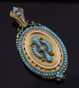 A Victorian etruscan style gold and turquoise set oval pendant locket, with beaded and scroll