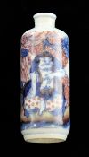 A Chinese underglaze blue and copper red snuff bottle, 1830-1900, painted with the figure of a