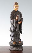 A Chinese rosewood and ivory figure of Guanyin, late 19th / early 20th century, the figure in