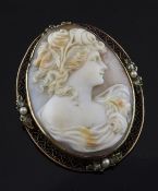 A 20th century 14ct gold, seed pearl and rose cut diamond set cameo brooch, of oval form, carved