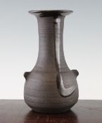 Janet Leach. A St Ives stoneware vase, of amphora form, fired in the biscuit with two raised handles