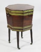 A George III mahogany and brass coopered octagonal wine cooler on stand, with square sectioned